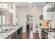 Kitchen features granite countertops, stainless steel appliances and laundry room access at 1851 White Fawn Ln, Rock Hill, SC 29730