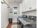 Laundry room with washer, dryer, and built-in cabinets at 1851 White Fawn Ln, Rock Hill, SC 29730