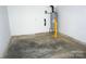 Unfinished garage with water heater and flooring at 1024 W C St, Kannapolis, NC 28081