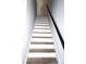 Modern staircase with white risers and wood treads at 1024 W C St, Kannapolis, NC 28081