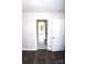 View down hallway showcasing an open door and flooring at 1024 W C St, Kannapolis, NC 28081