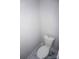 Small bathroom with white toilet and patterned floor at 1024 W C St, Kannapolis, NC 28081