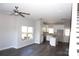 Open concept kitchen with white cabinets, stainless steel appliances, and island at 1024 W C St, Kannapolis, NC 28081