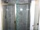 Modern shower with gray tile and blue glass accent at 1024 W C St, Kannapolis, NC 28081