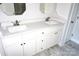 White double vanity with quartz countertop at 1024 W C St, Kannapolis, NC 28081