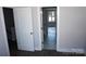 Hallway view with open doors to other rooms at 1024 W C St, Kannapolis, NC 28081