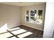 Spacious bedroom with large window and wood floor at 1024 W C St, Kannapolis, NC 28081