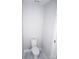 Small, clean bathroom with toilet and gray walls at 1024 W C St, Kannapolis, NC 28081
