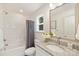 Simple bathroom with shower/tub combo and granite vanity at 2612 Senior Dr, Charlotte, NC 28216