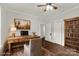 Bright home office features built-in bookcase and hardwood floors at 305 N White St, Lancaster, SC 29720