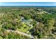 Aerial view of house, pool, and expansive green lawn at 1725 Deer Run Rd, Catawba, SC 29704