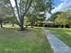 Brick ranch house with a large front yard at 3730 Birchdale Ct, Matthews, NC 28104