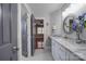 Elegant bathroom with granite countertop, large mirror, and hexagon tile floor at 211 Bullfinch Rd, Mooresville, NC 28117