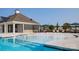 Community pool with spray features and cabana at 513 Zermatt Ct, Monroe, NC 28112