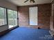 Sunroom features brick walls and a door at 526 Kings Rd, Shelby, NC 28150