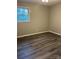 Bright bedroom with vinyl plank flooring and a ceiling fan at 526 Kings Rd, Shelby, NC 28150