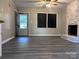 Living room with fireplace and vinyl plank flooring at 526 Kings Rd, Shelby, NC 28150