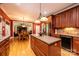 Open concept kitchen with island and view into the dining area at 3905 Granite St, Terrell, NC 28682