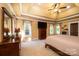 Spacious primary bedroom with tray ceiling, large windows, and ample closet space at 3905 Granite St, Terrell, NC 28682