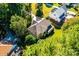 Aerial view of a two story house nestled among lush trees at 3905 Granite St, Terrell, NC 28682