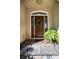 Elegant front door with wreath, flanked by sidelights at 3905 Granite St, Terrell, NC 28682