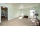 Well-lit bedroom with neutral decor and ceiling fan at 3905 Granite St, Terrell, NC 28682