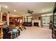 Relaxing living room with leather sofas, fireplace, and open floor plan at 3905 Granite St, Terrell, NC 28682