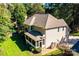 Tan house exterior with screened porch and large backyard at 3905 Granite St, Terrell, NC 28682