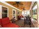 Relaxing screened porch with seating area and ceiling fans at 3905 Granite St, Terrell, NC 28682