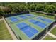 Aerial view of six well-maintained pickleball courts at 105 Coral Bells Ct, Mooresville, NC 28117