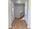 Bright entryway with hardwood floors and staircase at 1018 Cross Creek Dr, Oakboro, NC 28129