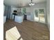 Modern kitchen with white cabinets and island at 1018 Cross Creek Dr, Oakboro, NC 28129