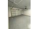 Finished garage with epoxy flooring and automatic garage door opener at 1018 Cross Creek Dr, Oakboro, NC 28129