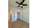 Bedroom with hardwood floors, ceiling fan, and closet at 1018 Cross Creek Dr, Oakboro, NC 28129