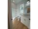 Bathroom with bathtub, toilet, and white vanity at 1018 Cross Creek Dr, Oakboro, NC 28129