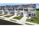 New townhouses with attached garages and landscaped yards at 107 Jameson Park Dr # 3, Troutman, NC 28166