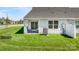 Landscaped backyard with patio and privacy fence at 107 Jameson Park Dr # 3, Troutman, NC 28166