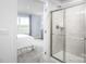 Bathroom with shower and view into bedroom at 107 Jameson Park Dr # 3, Troutman, NC 28166