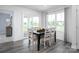 Casual dining area with table and chairs near sliding glass door at 107 Jameson Park Dr # 3, Troutman, NC 28166