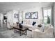 Spacious living room featuring neutral colors and ample natural light at 107 Jameson Park Dr # 3, Troutman, NC 28166