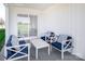 Relaxing patio with outdoor seating and sliding glass door at 107 Jameson Park Dr # 3, Troutman, NC 28166