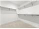 Spacious walk-in closet with ample shelving and hanging rods at 2149 Highland St, Charlotte, NC 28208