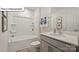 Clean bathroom with tub, shower, and modern vanity at 4164 Lurelin Ln, Charlotte, NC 28262