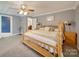Spacious bedroom with ceiling fan, a large bed and plenty of light at 846 Windy Oaks Way, Lancaster, SC 29720