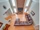 Open living room with a large sectional sofa and brick fireplace at 846 Windy Oaks Way, Lancaster, SC 29720