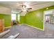 Bright bedroom with green walls, ceiling fan, and ample space at 846 Windy Oaks Way, Lancaster, SC 29720