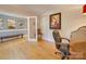 Spacious home office featuring hardwood floors and a roll-top desk at 846 Windy Oaks Way, Lancaster, SC 29720