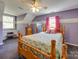 Charming bedroom with a wooden bed frame and flamingo bedding at 846 Windy Oaks Way, Lancaster, SC 29720