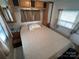 Bright bedroom with a double bed and mirrored closet at 134 Dove Ln, New London, NC 28127
