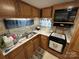 Efficient kitchen with ample cabinetry and appliances at 134 Dove Ln, New London, NC 28127